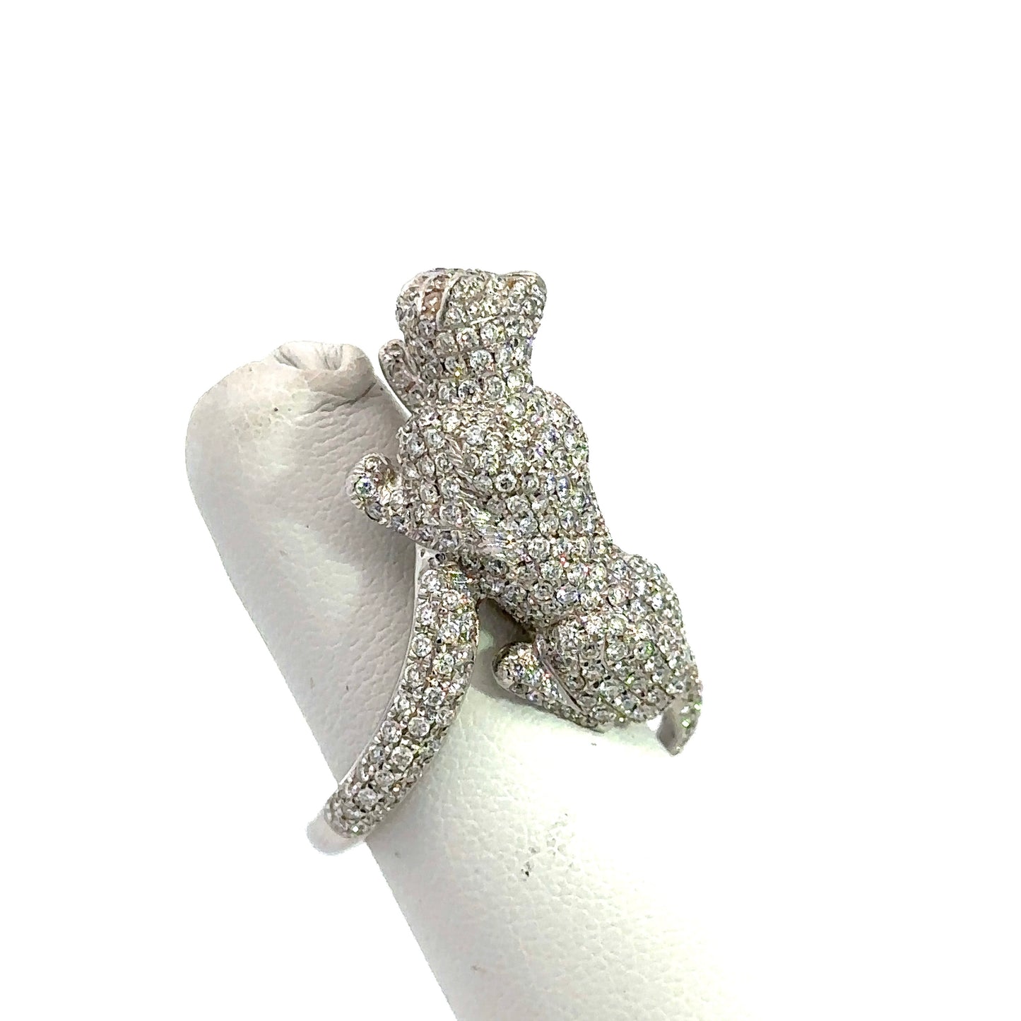 Side of diamond panther ring with diamonds on the panther and diamonds on half the band.