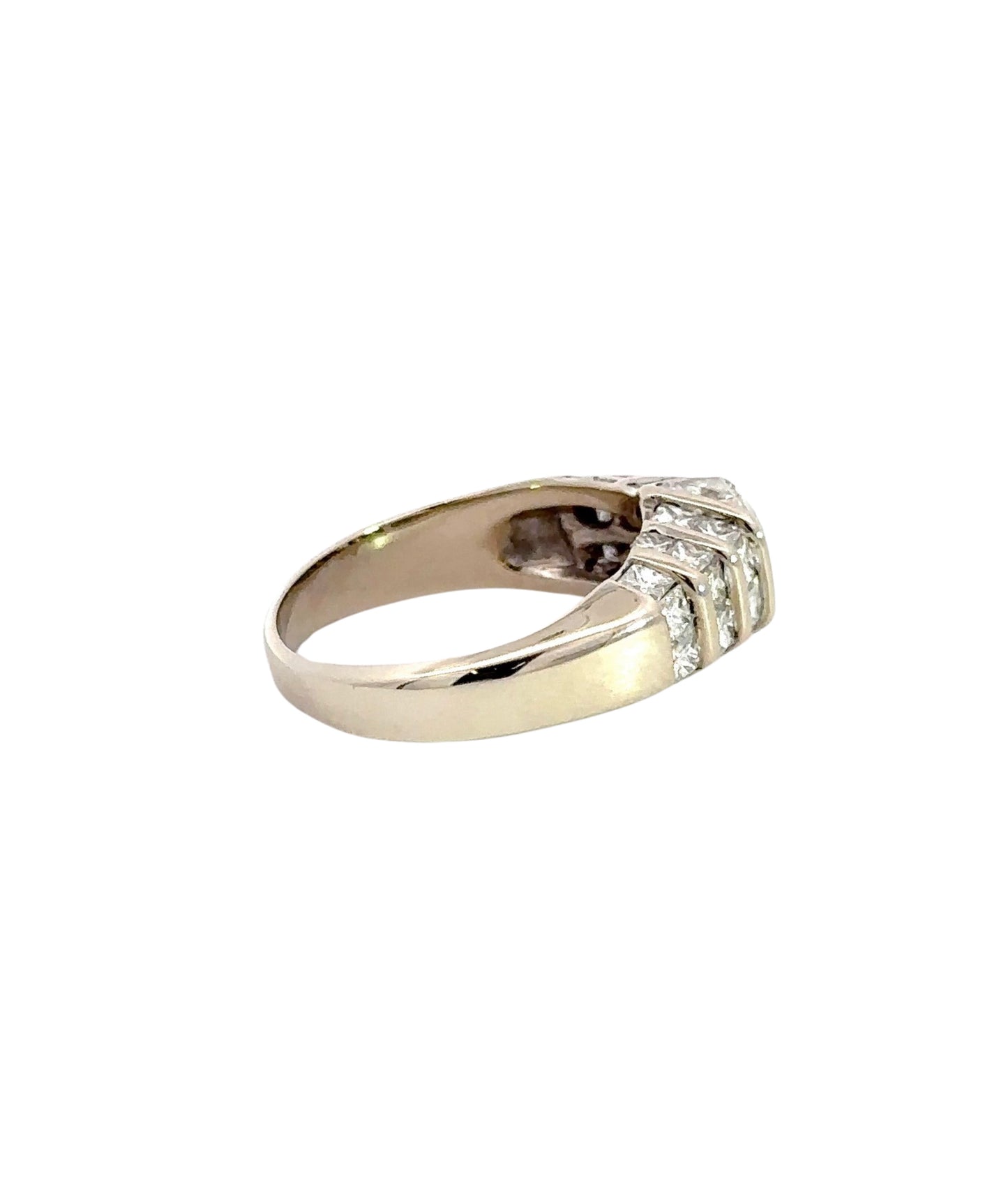 side of white gold ring with small scratch on gold