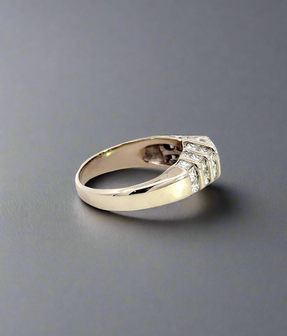 side of white gold ring with small scratch on gold