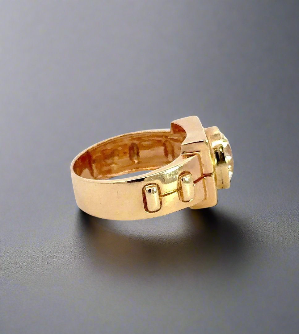 side of yellow gold ring with light scratches on gold