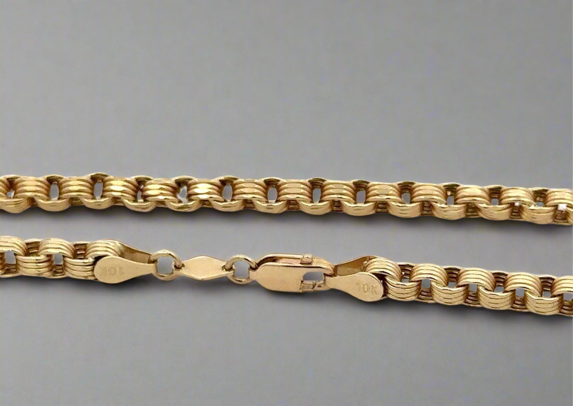 close up of yellow gold chain with 10K stamp on lobster clasp