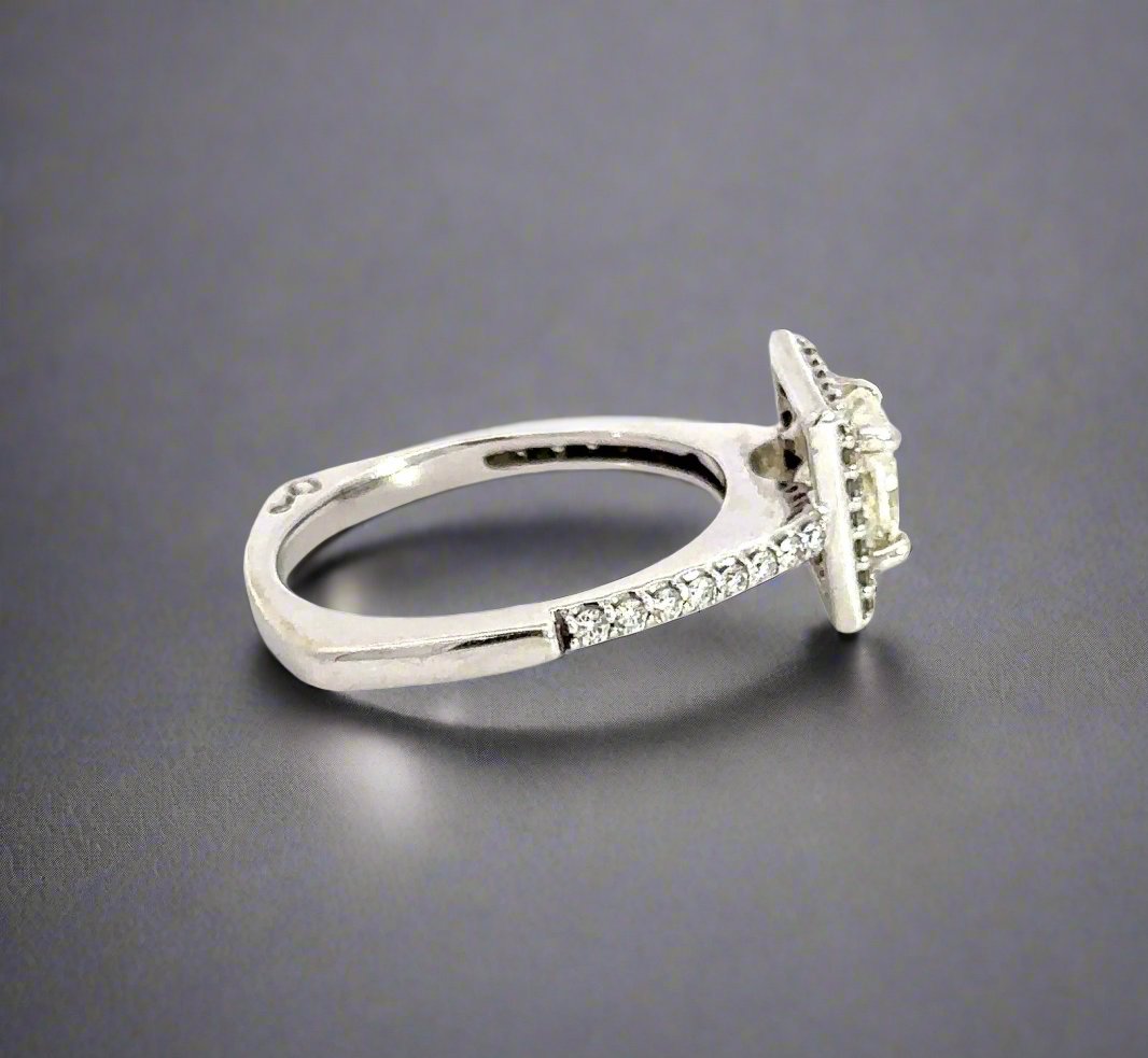 Side of white gold ring with scratches on gold