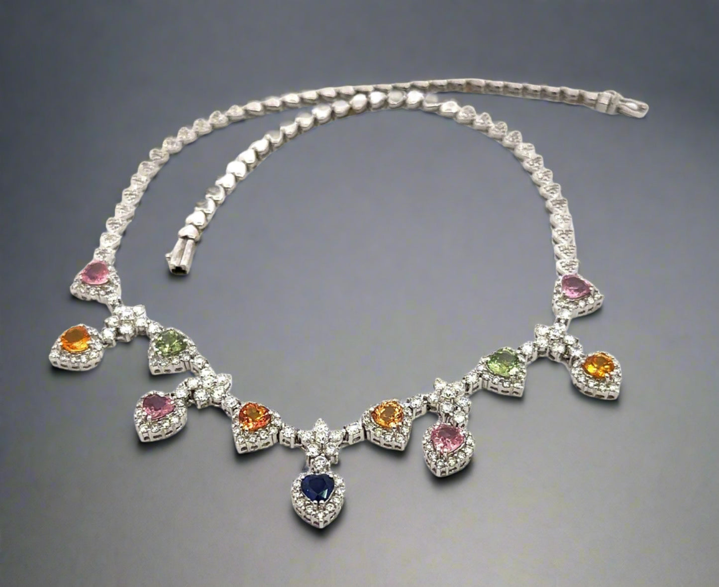 diamond and colored stone necklace lying down