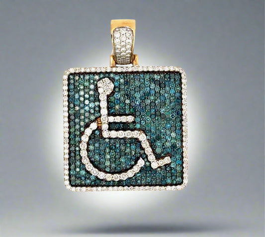 Handicap pendant with white and blue diamonds. The white diamonds feature an outline of a stick person in a wheelchair like the handicap symbol and outline the square pendant. Blue diamonds cover the background.