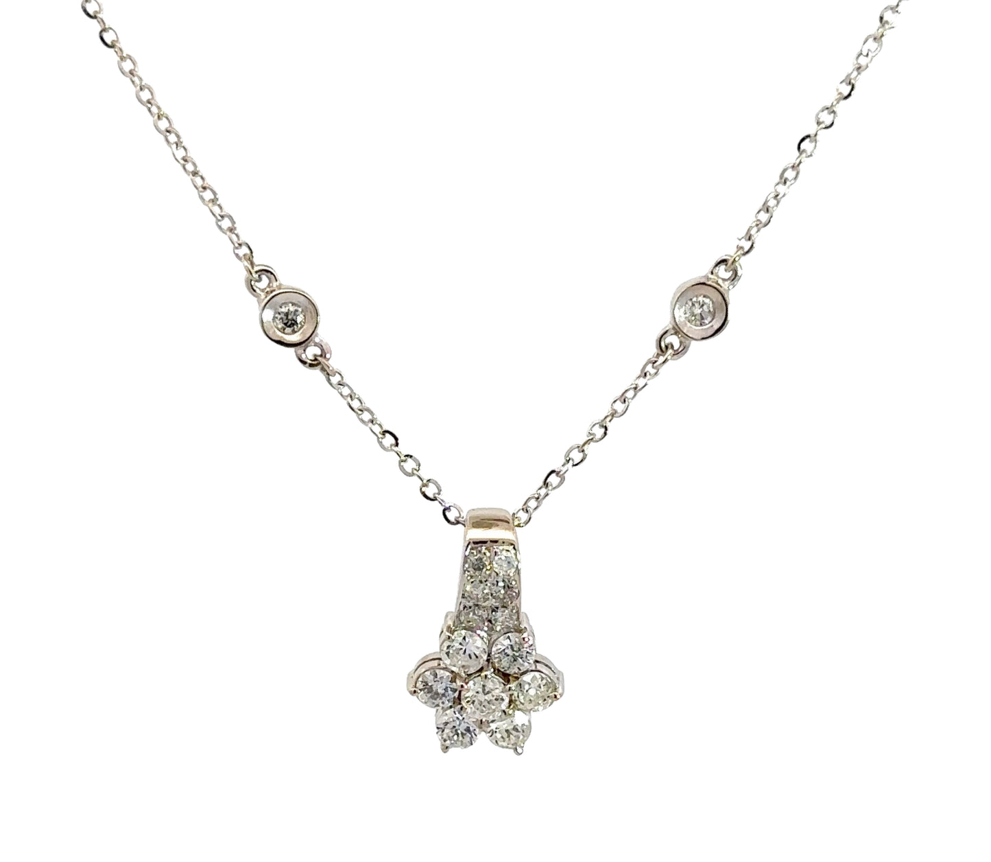 Diamond flower necklace with floral design as the drop and bezel-set diamonds by the yard on the chain