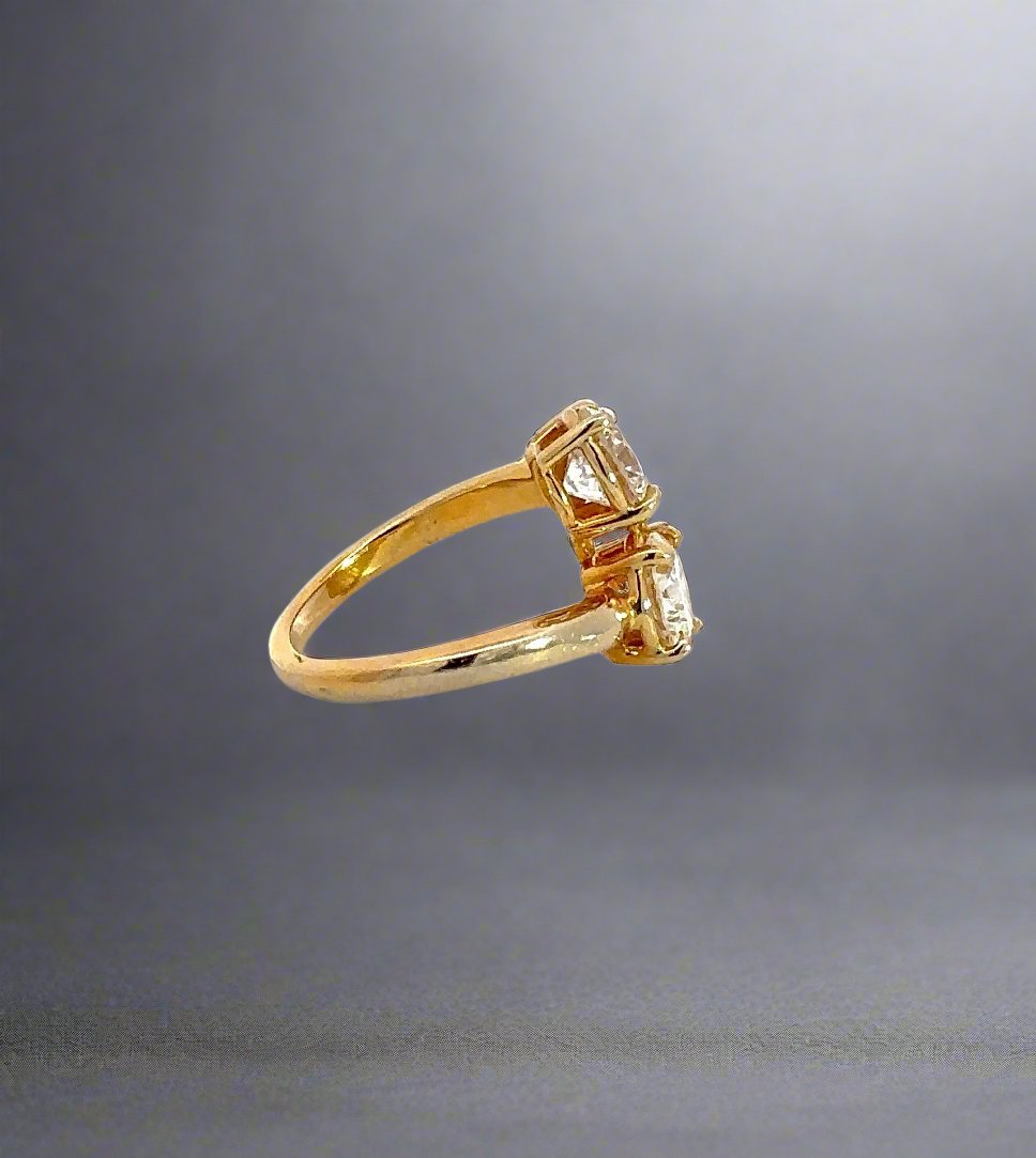 Side of yellow gold ring with scratches on gold