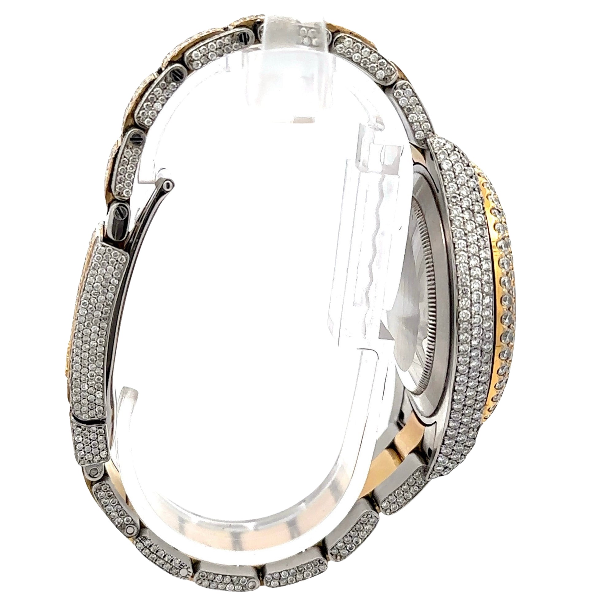 Side of watch with diamonds on side of clasp, band, and case.