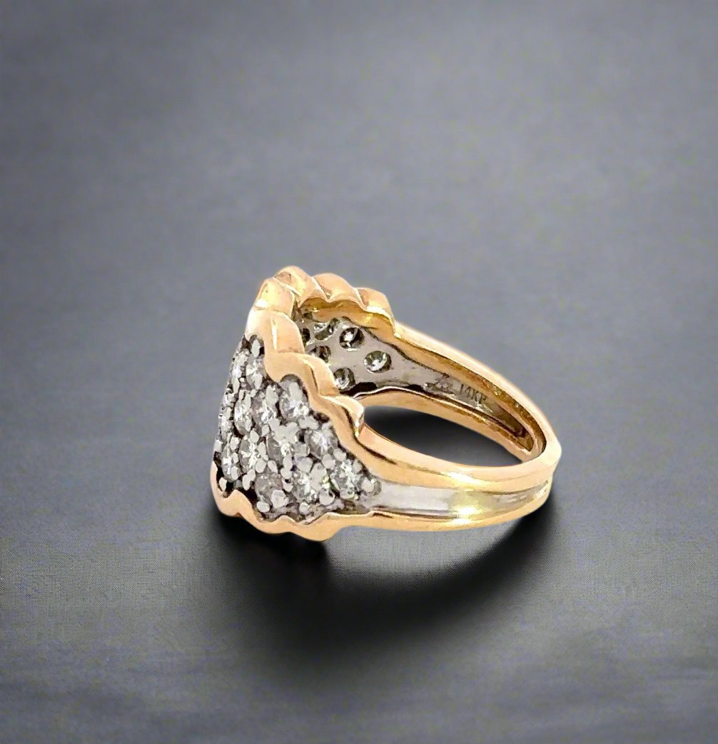 side of yellow and white gold ring with 14K stamp on inside