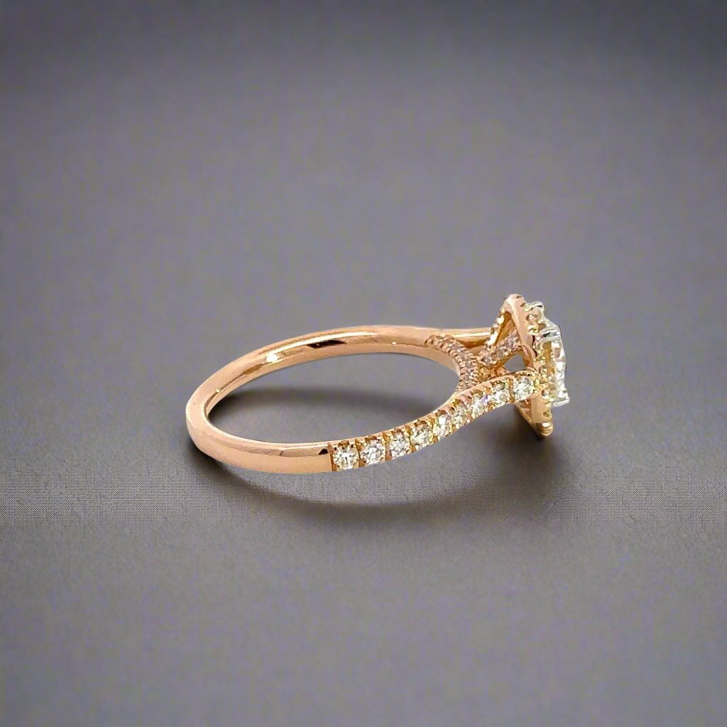 Side of rose gold ring with 9 round diamonds on band