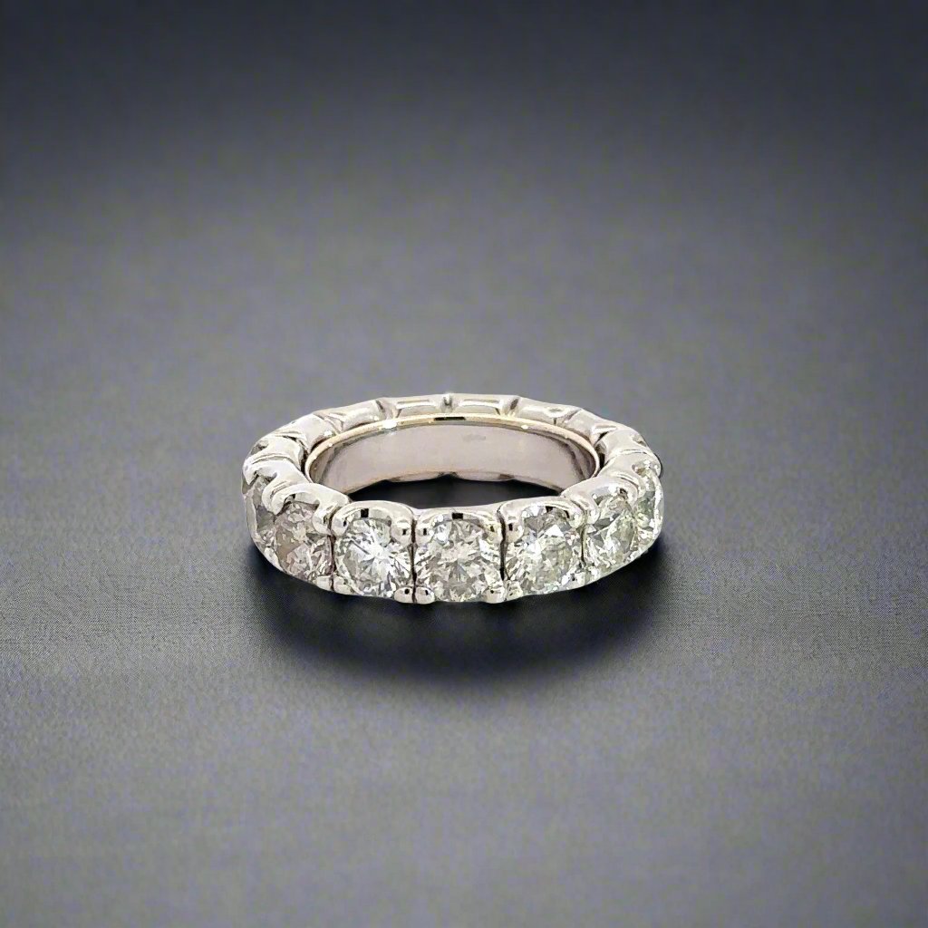 White gold diamond band ring with round diamonds all the way around