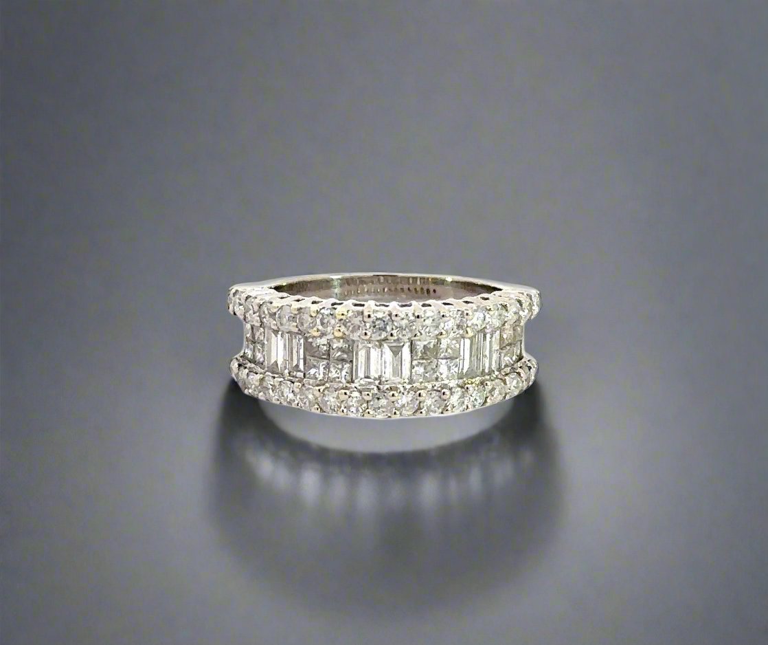front of white gold band ring with round diamonds on top and bottom and alternating baguette and princess-cut diamonds in middle