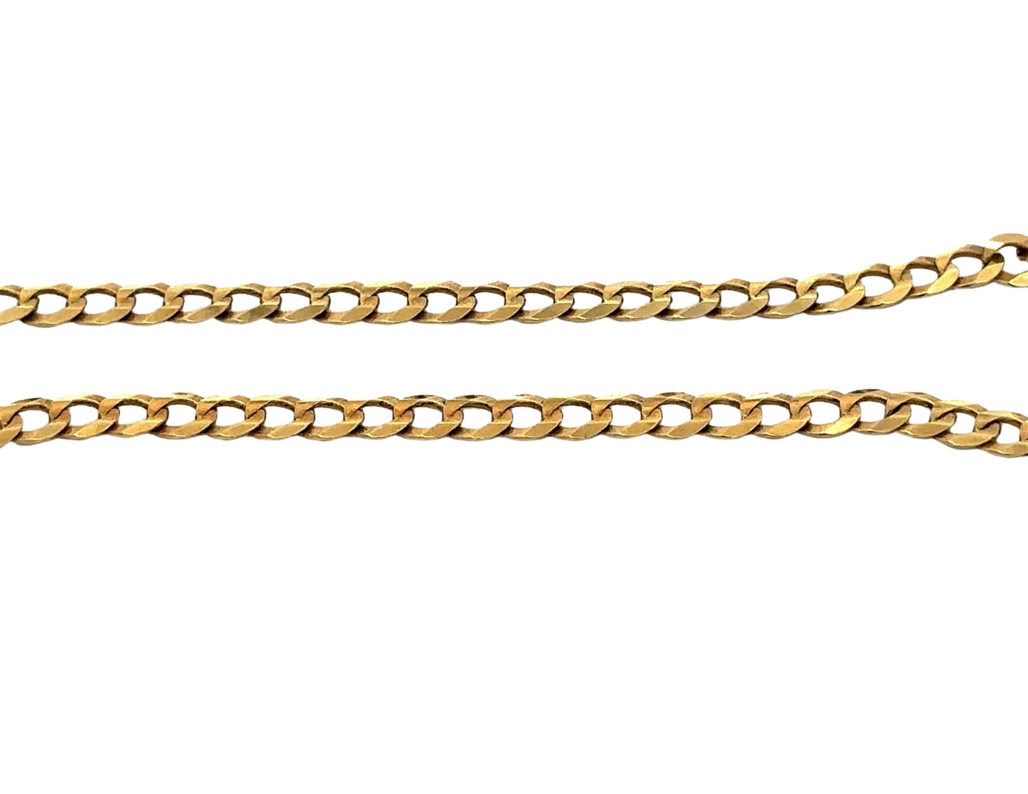 close up yellow gold curb link chain