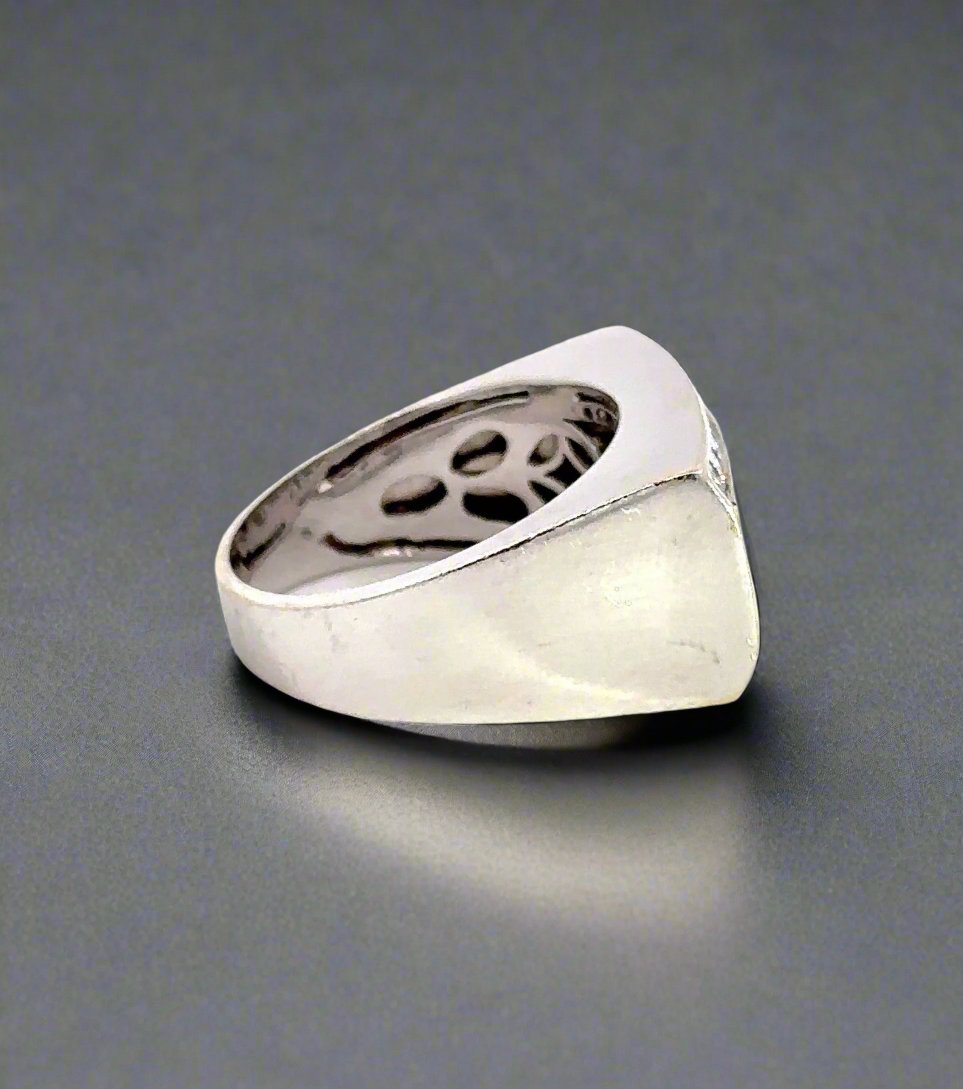 side of white gold ring with scratches