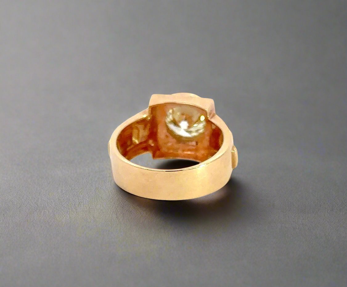 back of yellow gold ring with scratches on gold
