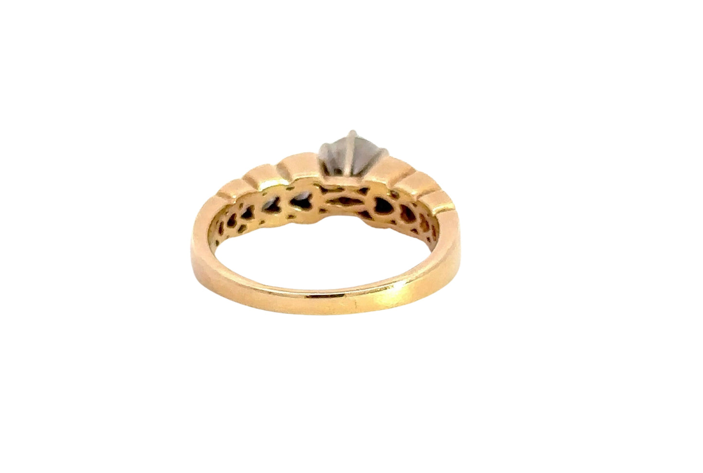 Back of yellow gold ring with scratches on gold