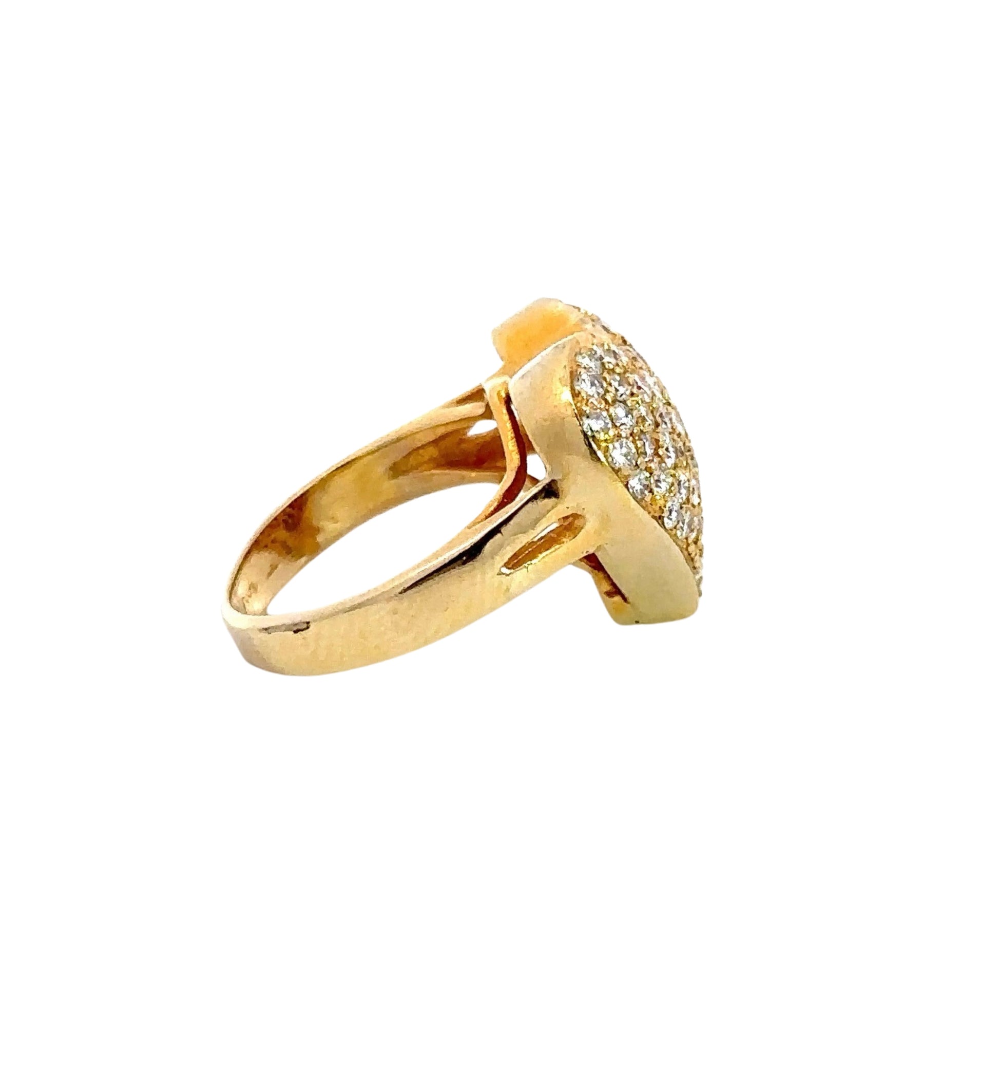 side of yellow gold heart ring with a scratch on the shank