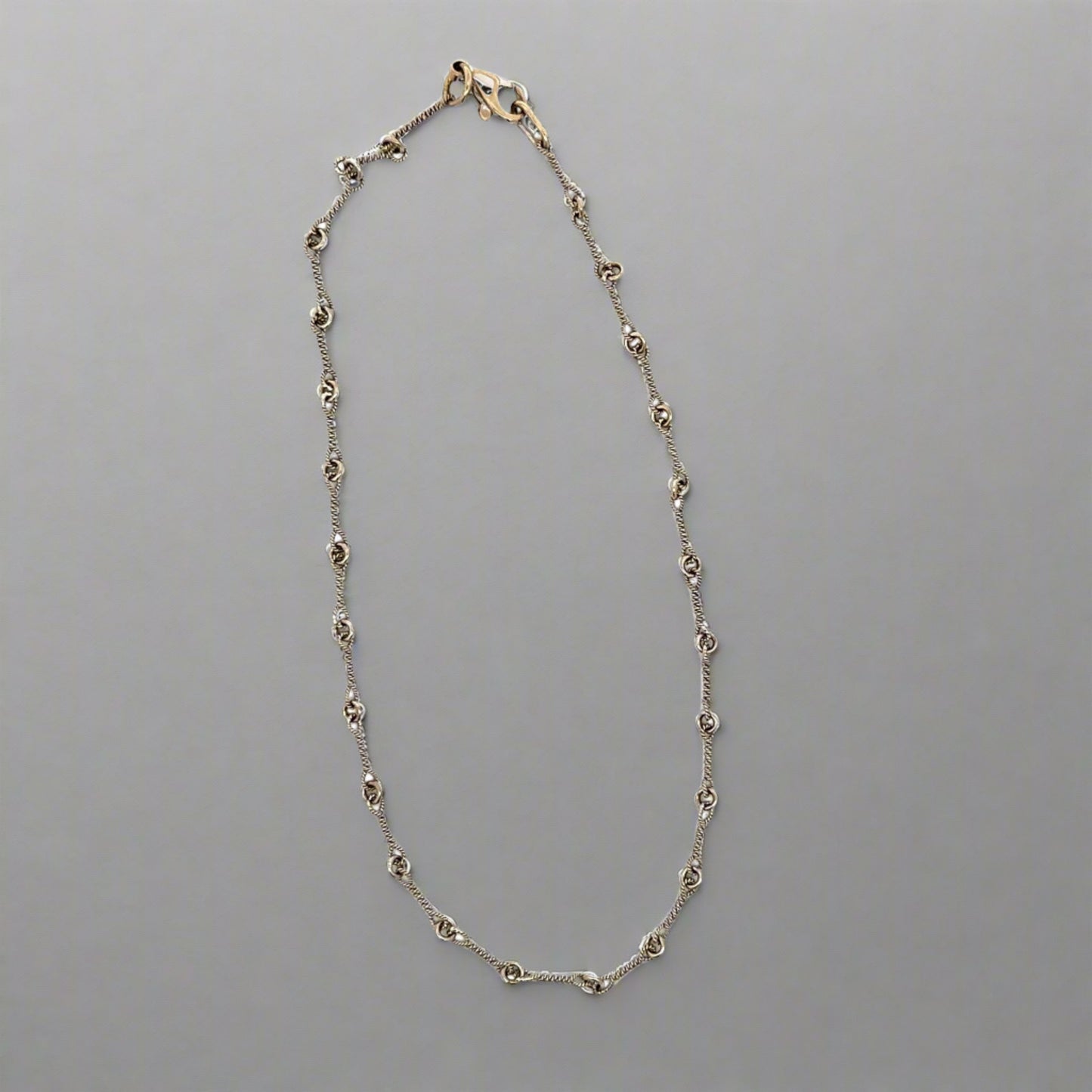 white gold anklet with knot detailing