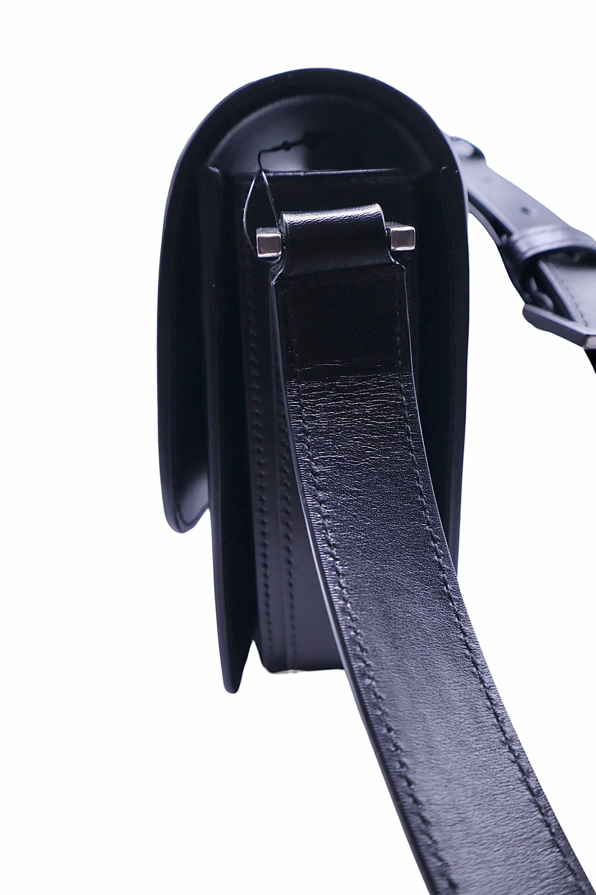 Side of black YSL bag with adjustable shoulder strap