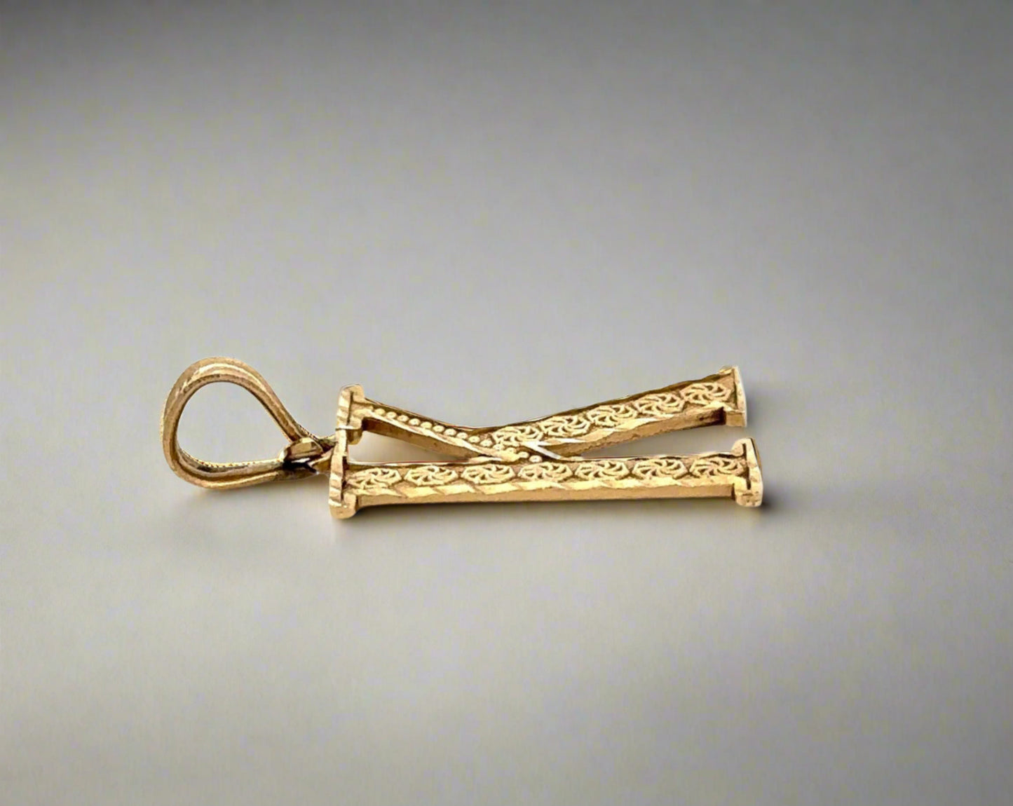 side of k pendant with round bail