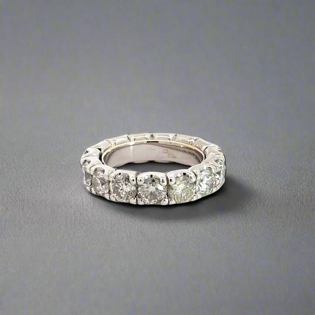 white gold diamond band ring with diamonds all around ring