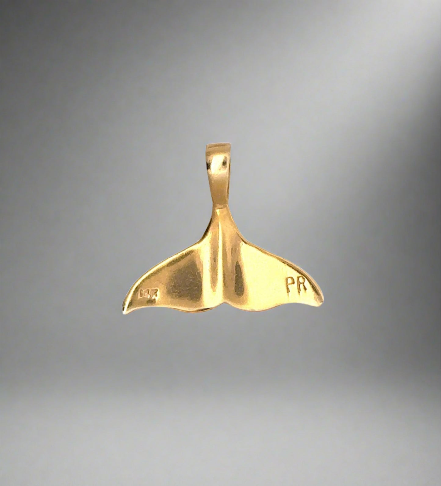 back of yellow gold whale tail pendant with "PR" + 14K stamp