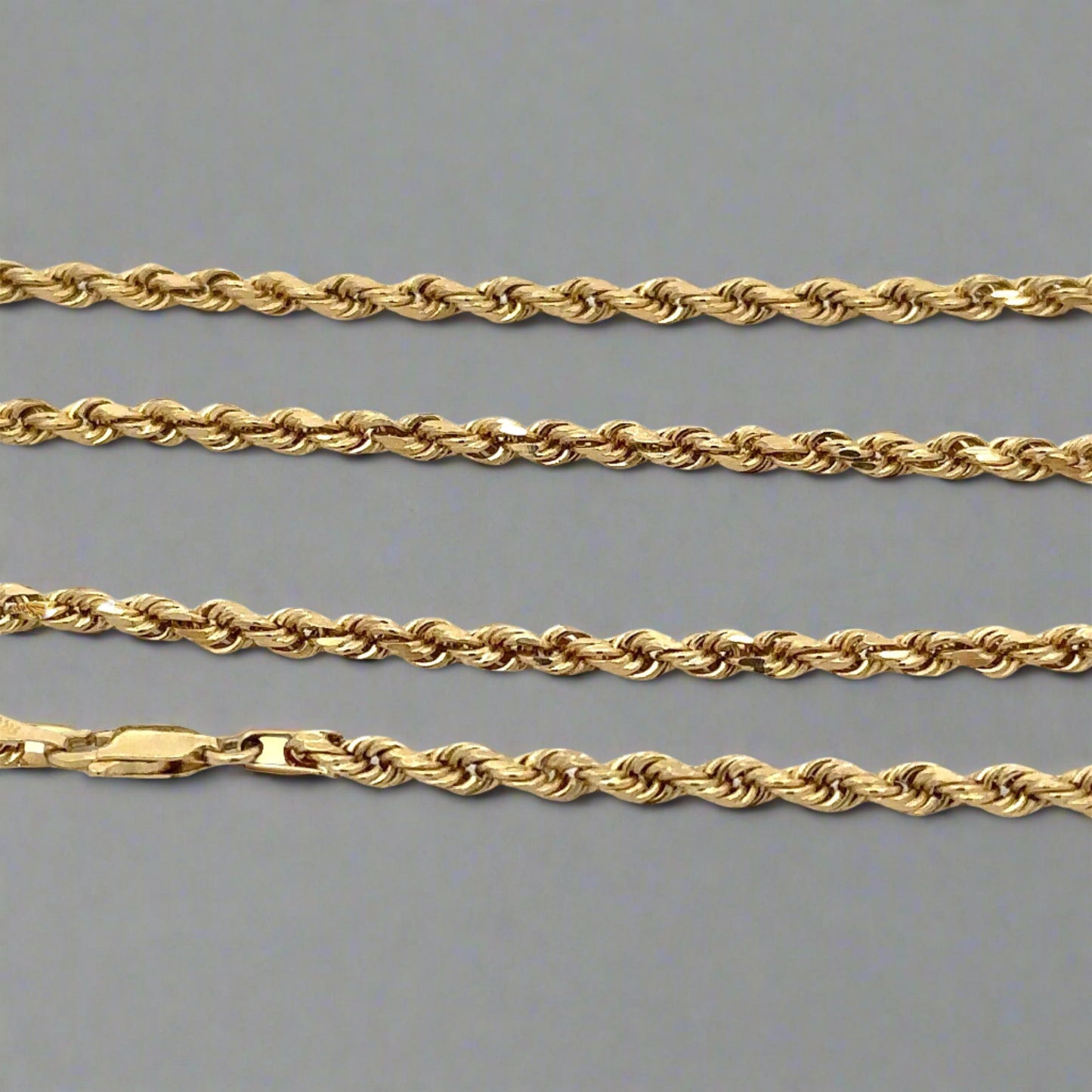 close up of yellow gold rope chain