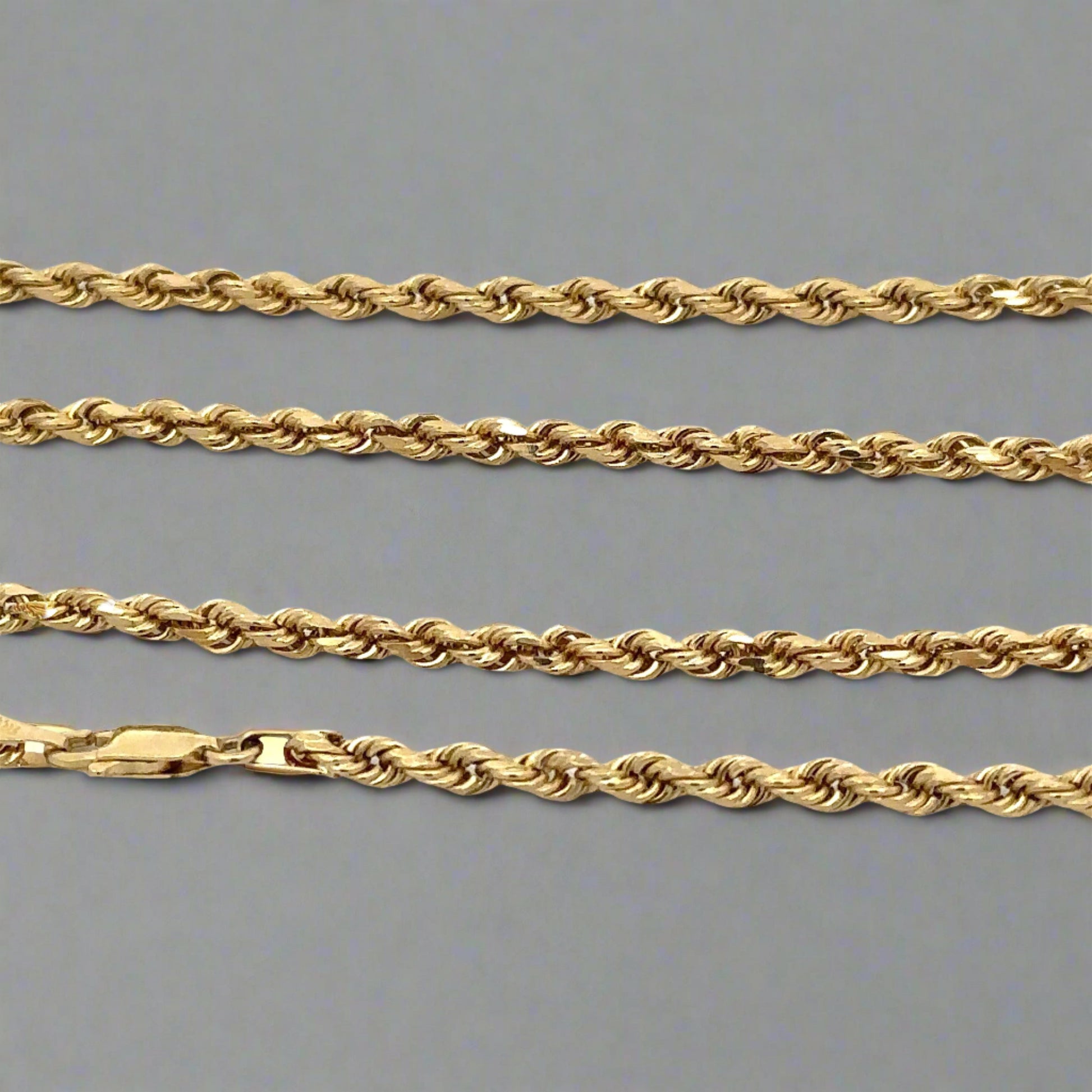 close up of yellow gold rope chain