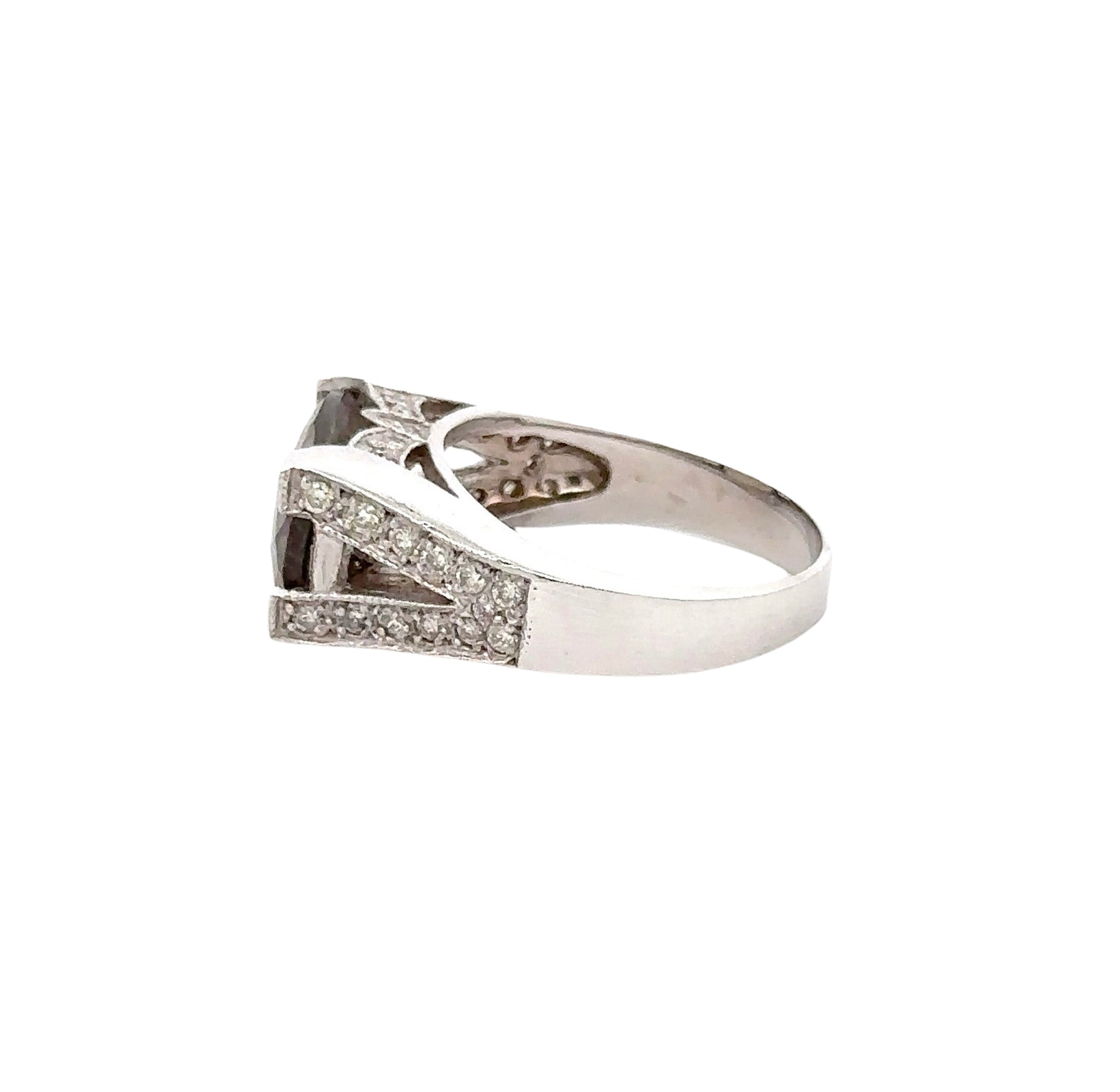 Side of white gold ring with small round diamonds on the band