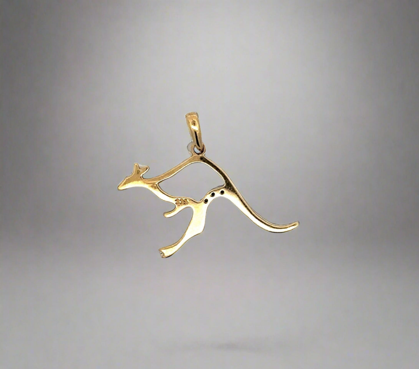 Back of kangaroo pendant with 375 stamp for 9K gold