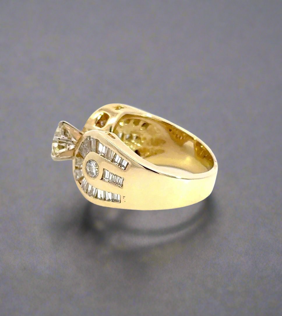 side of yellow gold ring with light scratch on gold