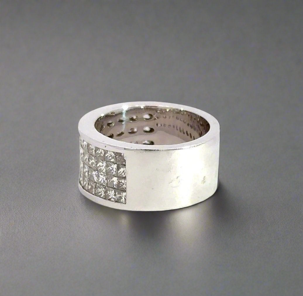 side of white gold band ring with scratches on gold