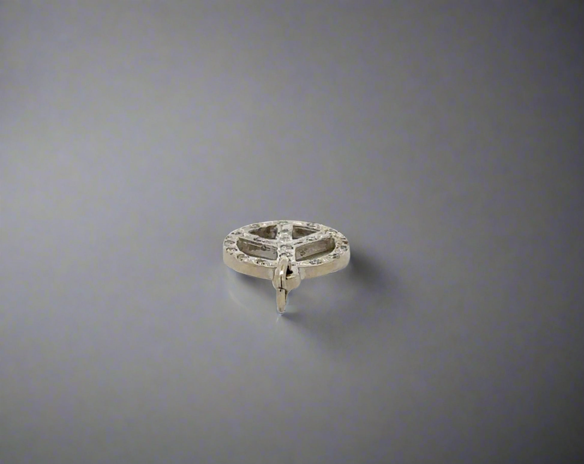Top of peace sign pendant
