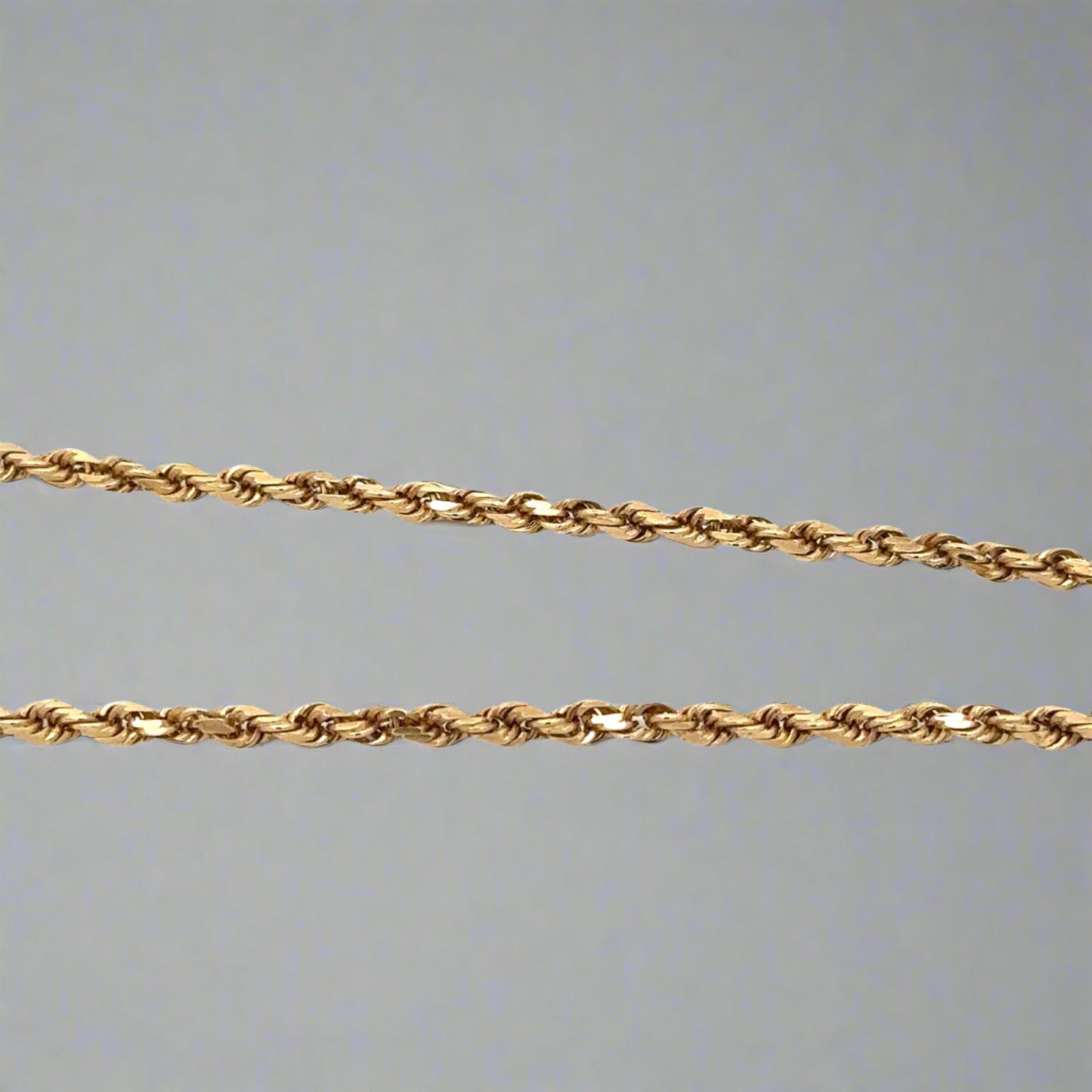 close up of rope chain in yellow gold