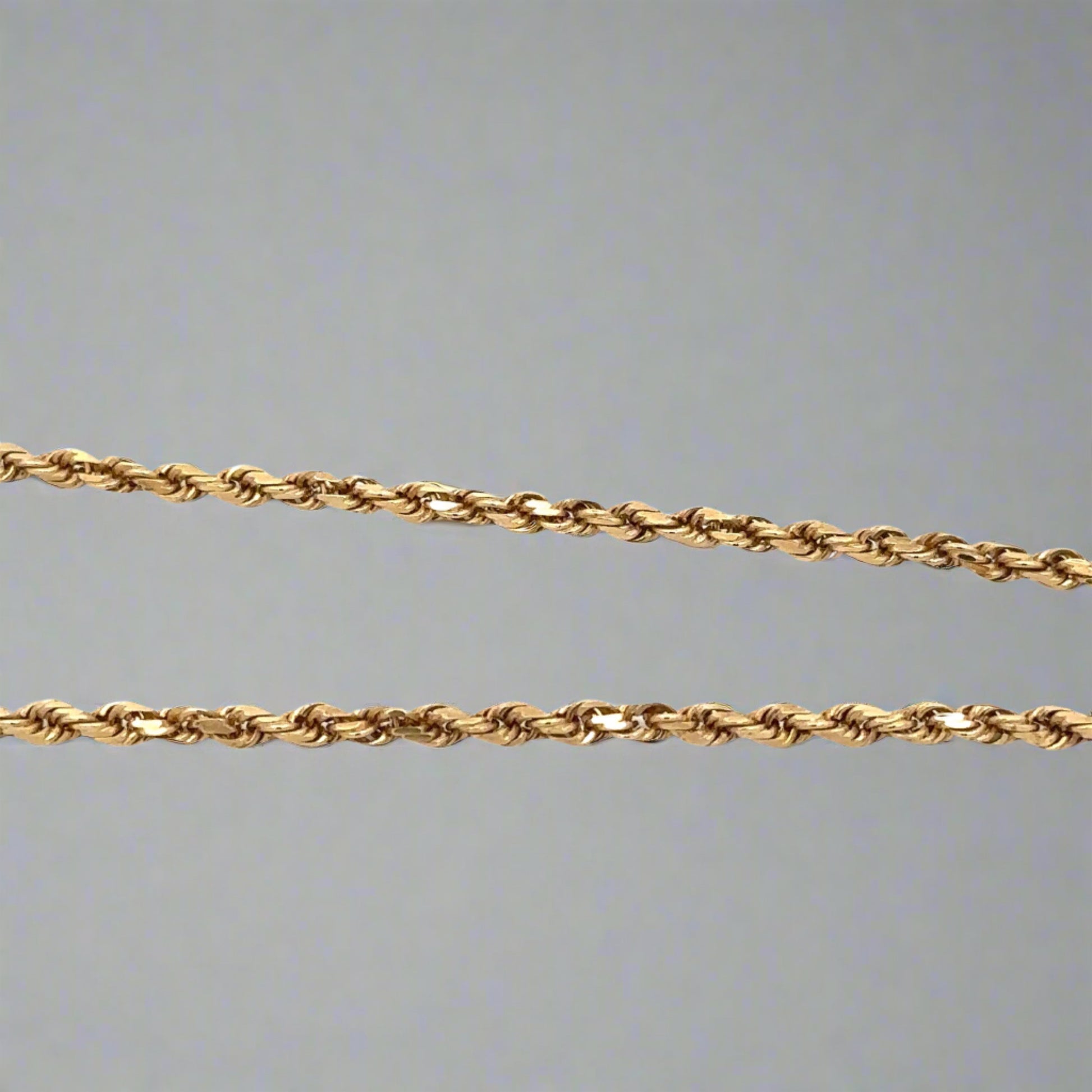 close up of rope chain in yellow gold