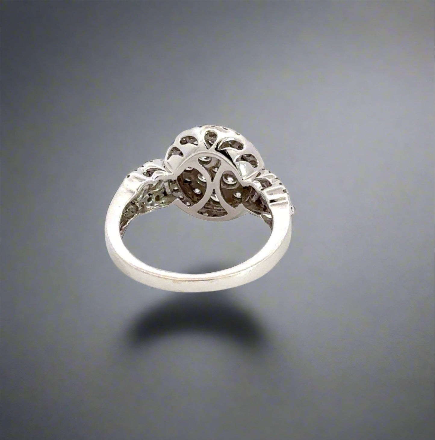 Back of white gold ring with light marks on the shank