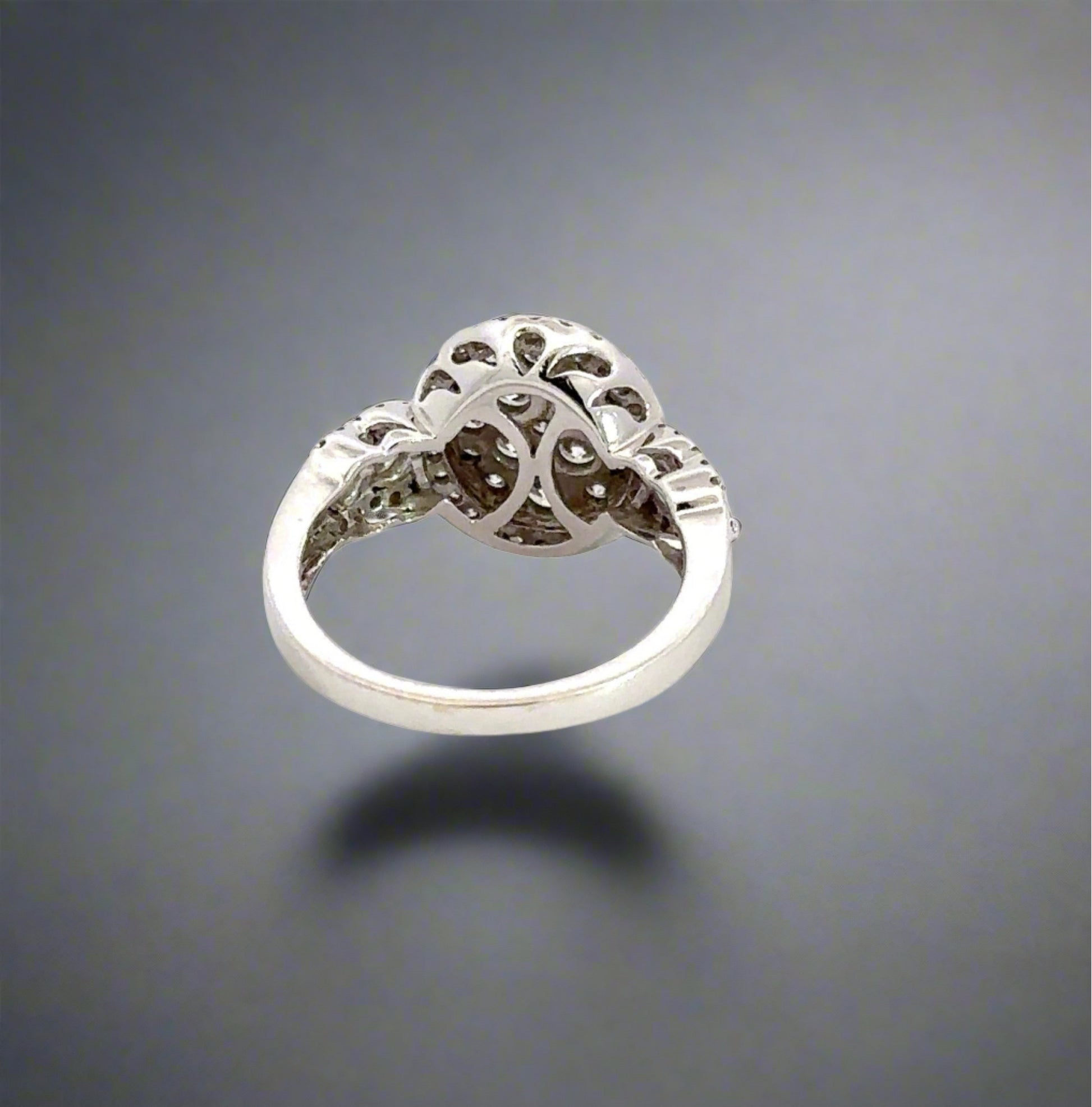 Back of white gold ring with light marks on the shank