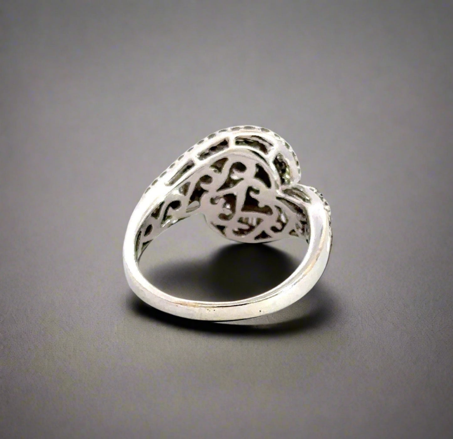 Back of white gold ring with scratches on shank