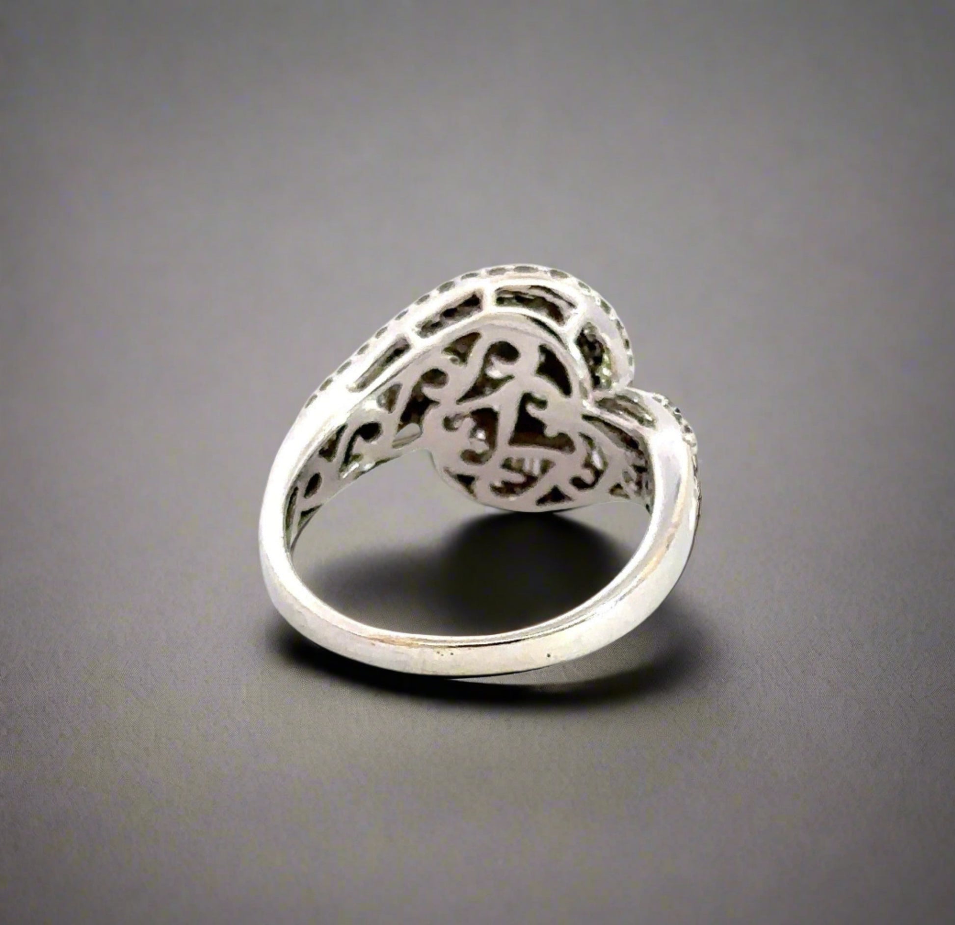 Back of white gold ring with scratches on shank