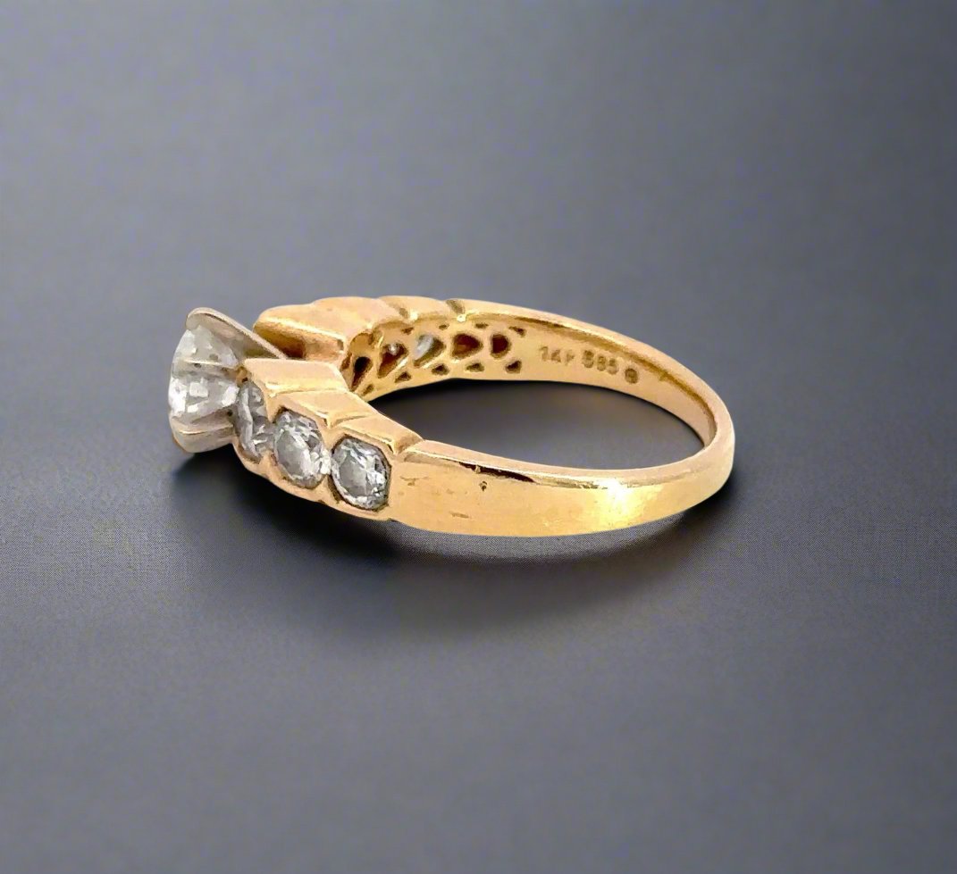Side of yellow gold ring with scratches on band