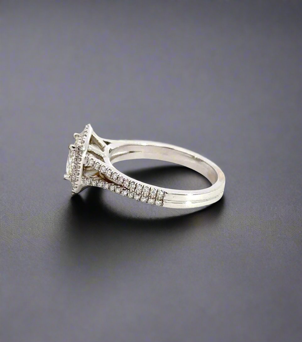side of white gold diamond ring with 2 rows of small diamonds on band