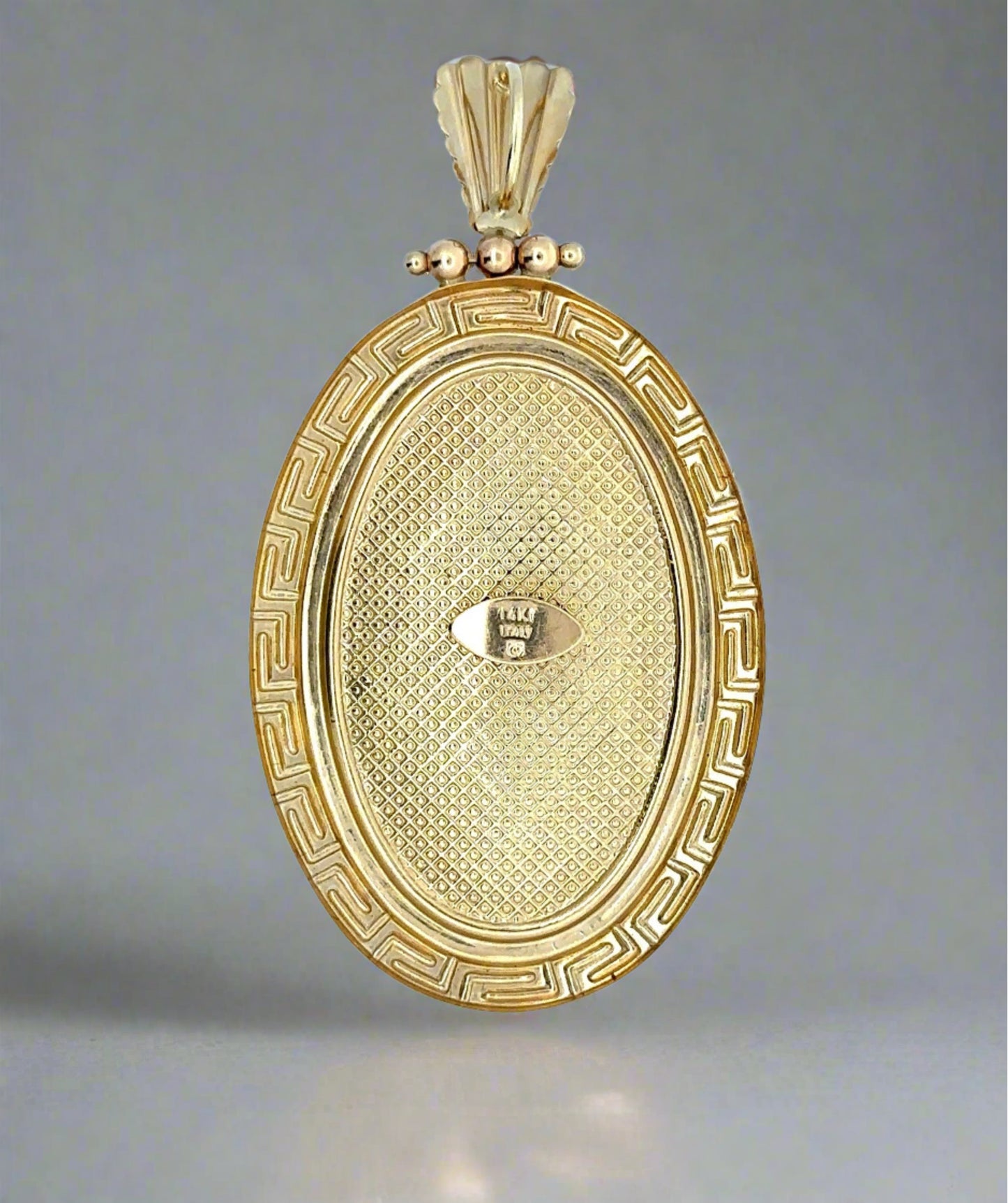 Back of vintage-style lady charm with 14K stamp