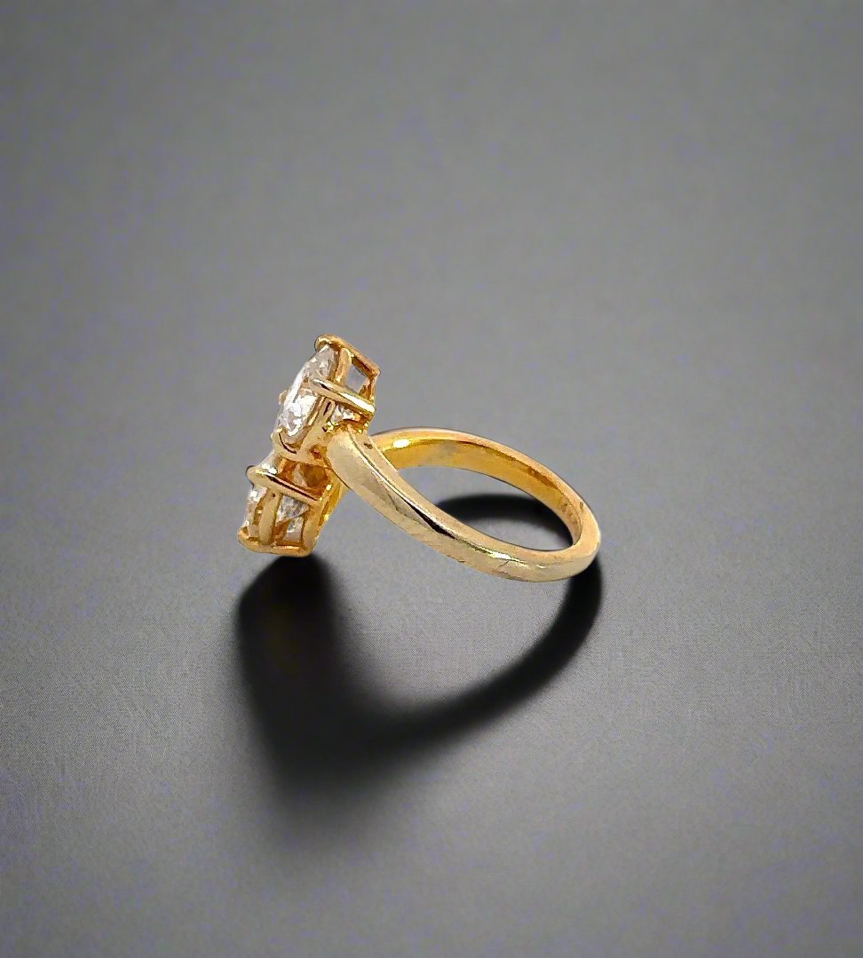 Side of yellow gold ring with scratches on gold