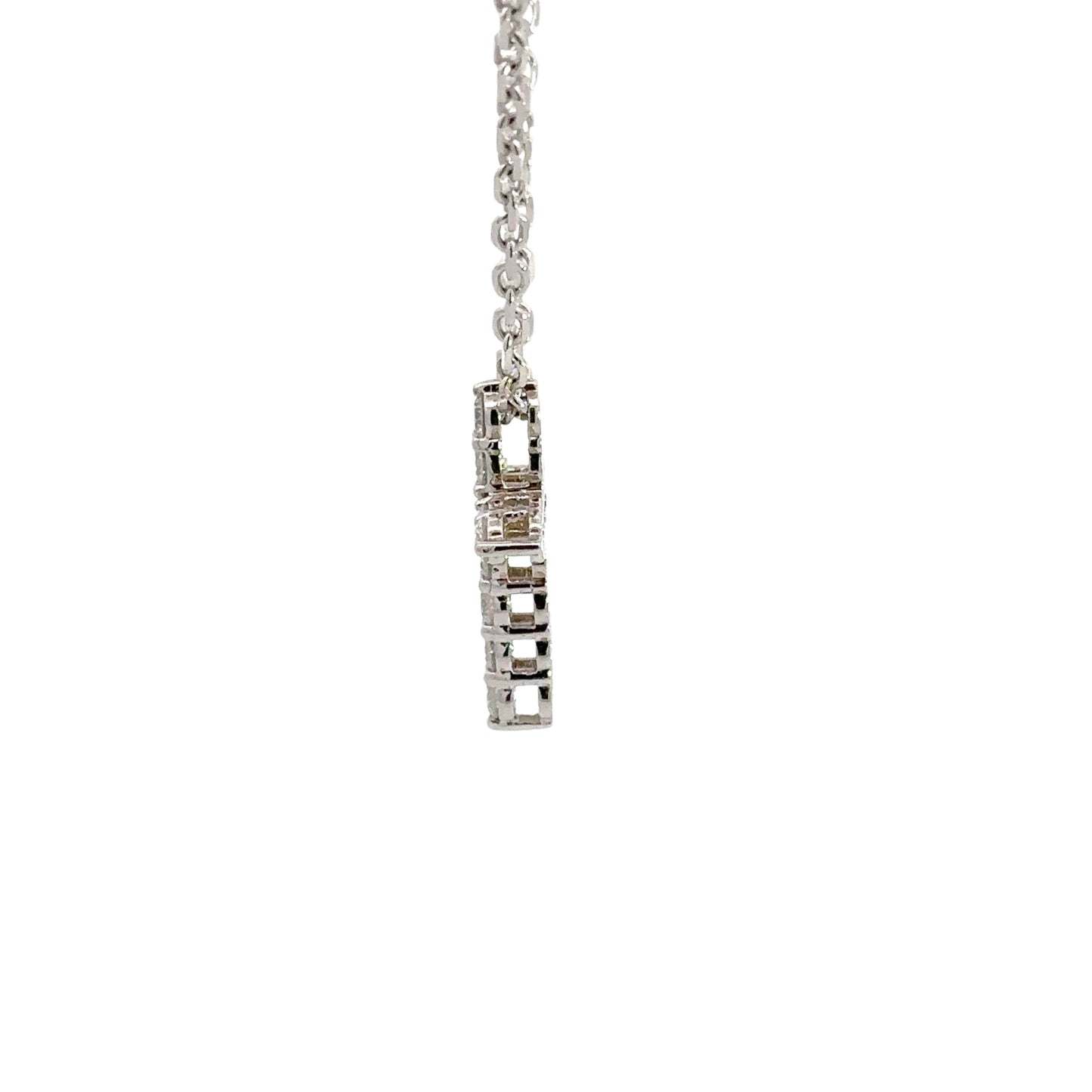 Side of white gold diamond cross with open back