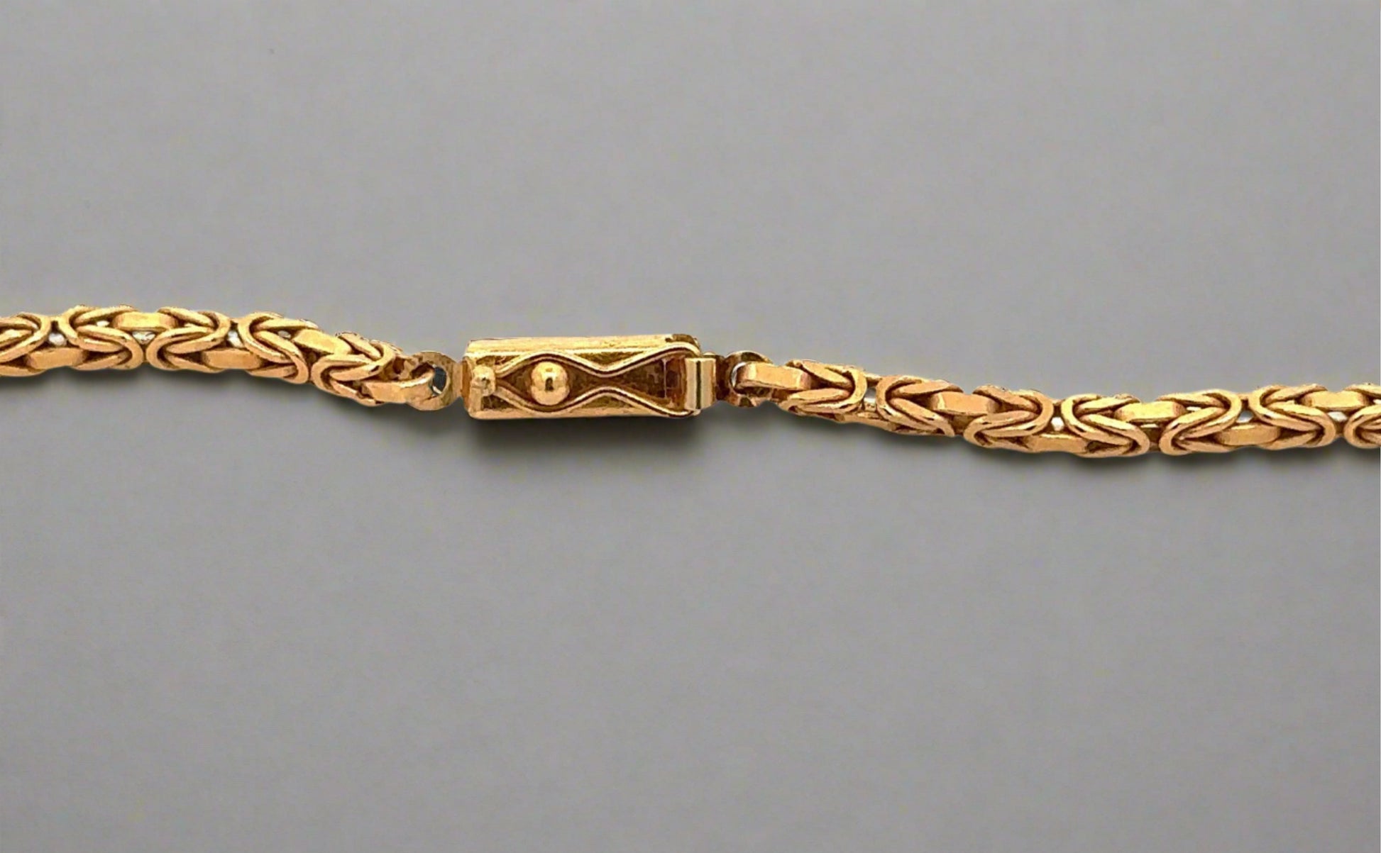 Box clasp with safety lock