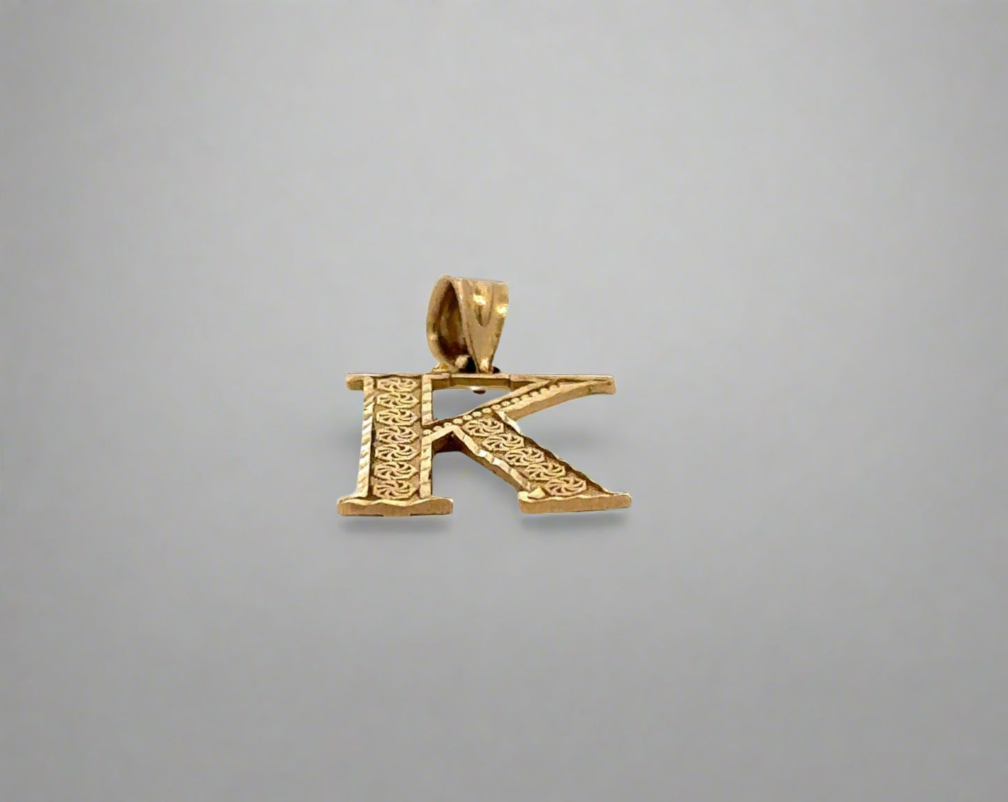 bottom of k pendant
