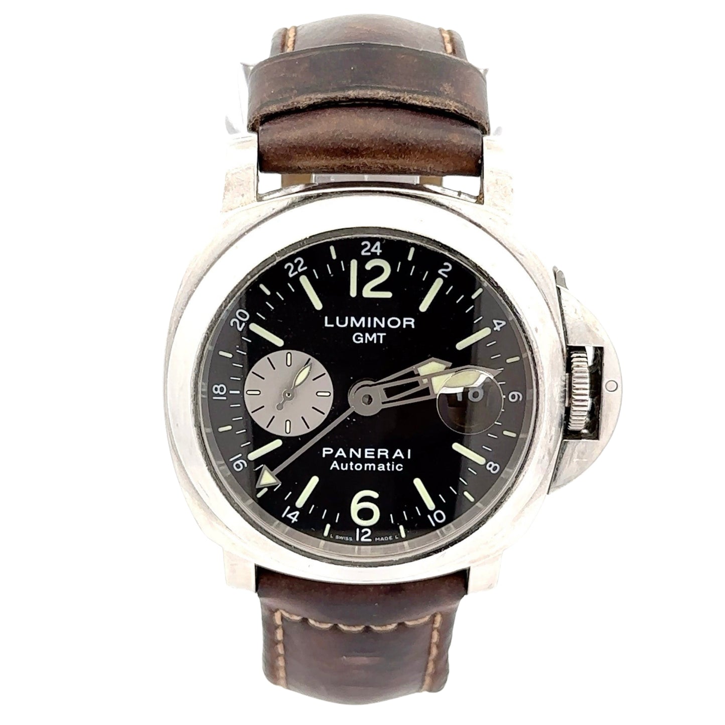 Panerai Luminor GMT Automatic with brown leather band showing wear and scratches on case of watch. Black dial