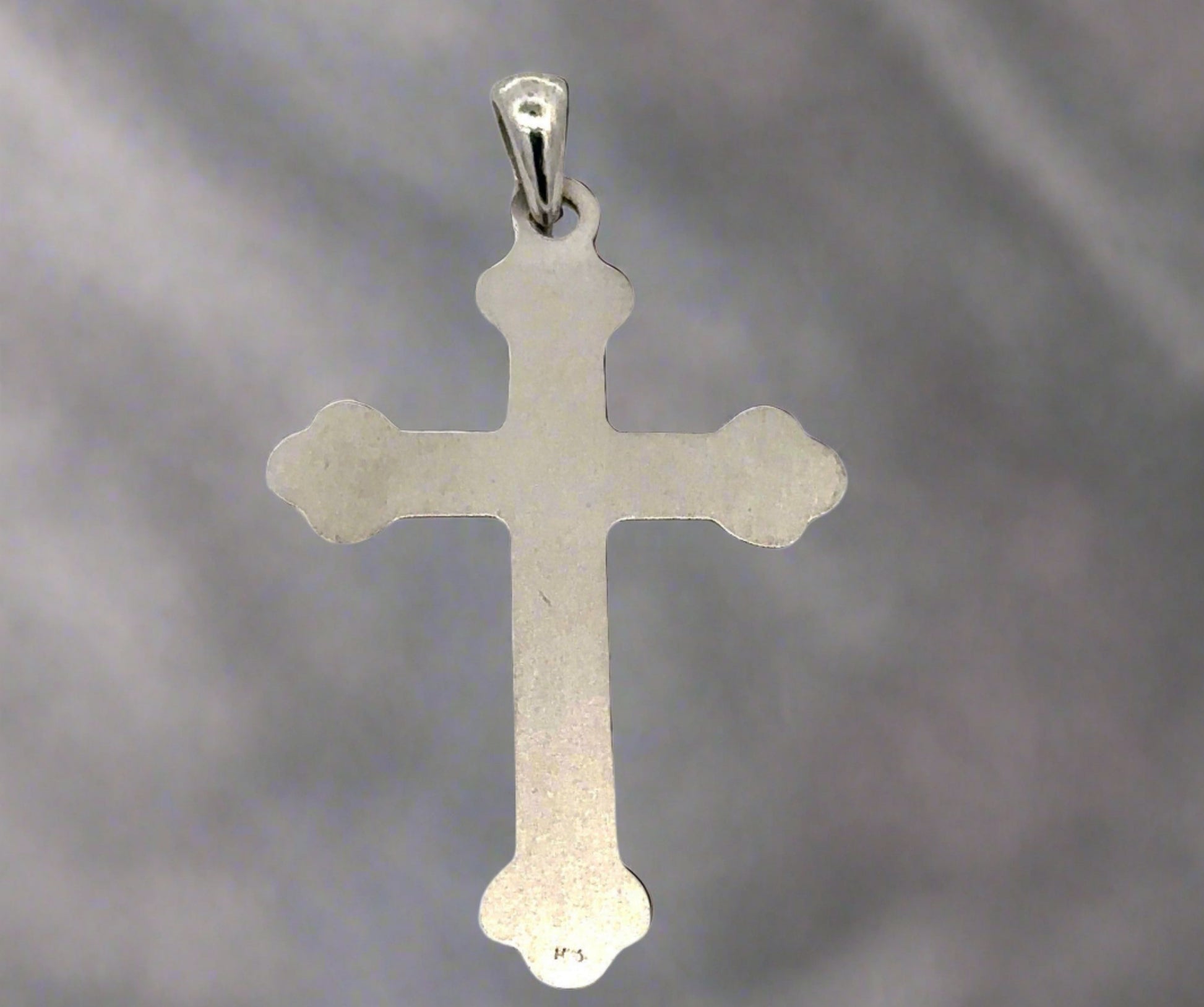 Back of white gold cross with small 14K stamp on bottom + light signs of wear.