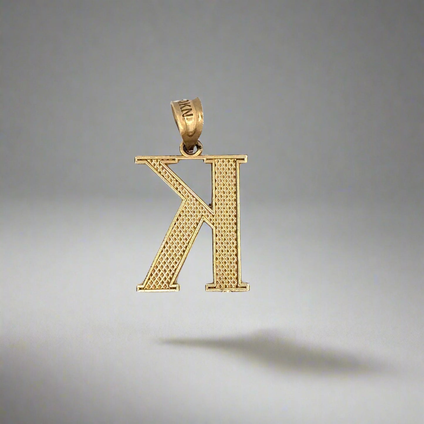 back of k pendant