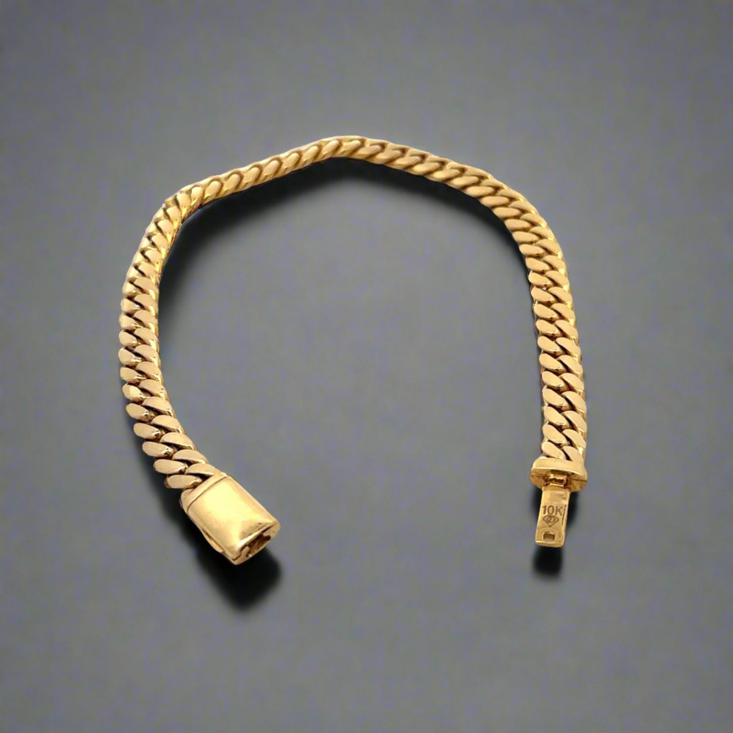 Open yellow gold Miami Cuban Link bracelet with 10K stamp on clasp