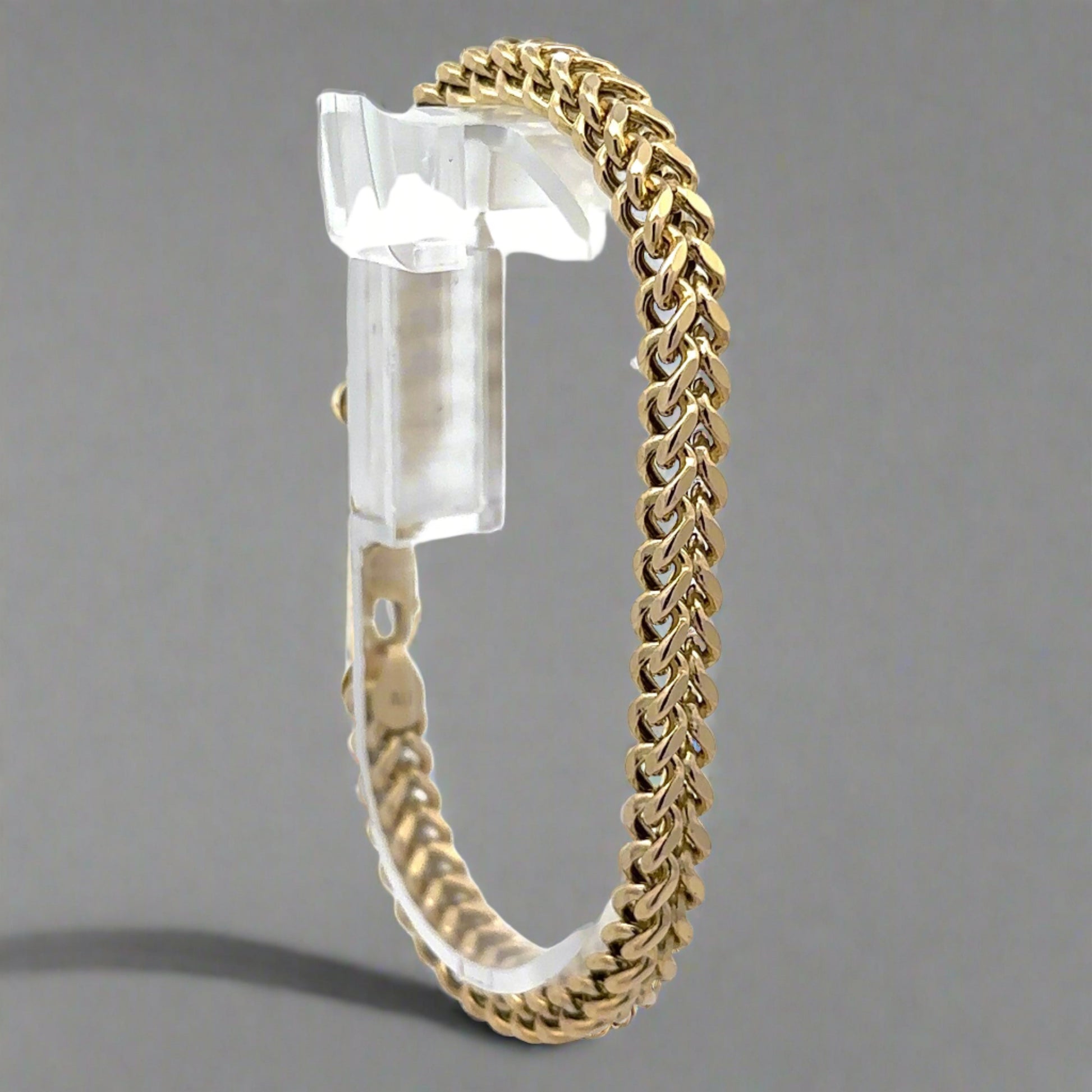 Diagonal view of yellow gold square franco bracelet